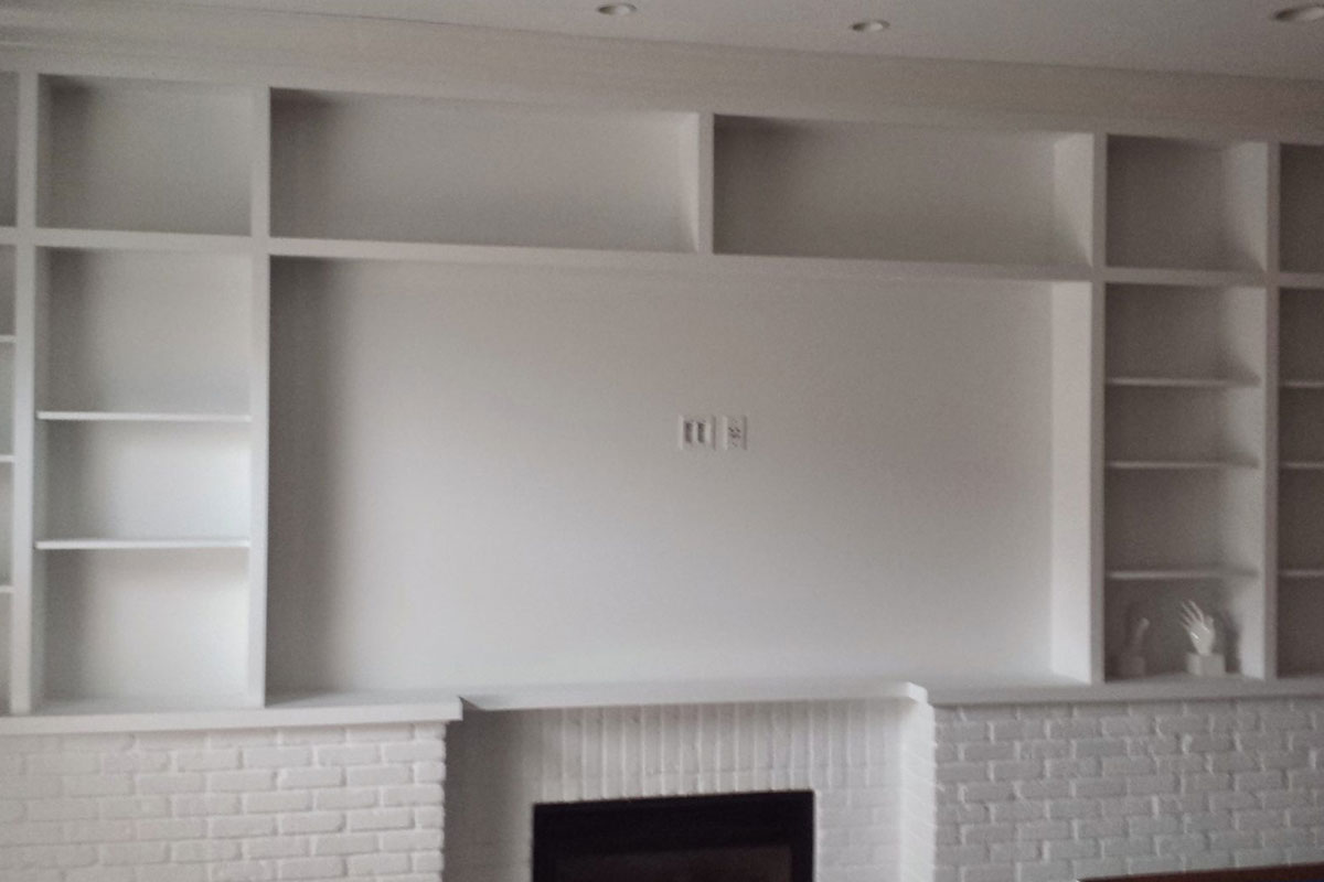 Updated Fireplace area with new shelving units