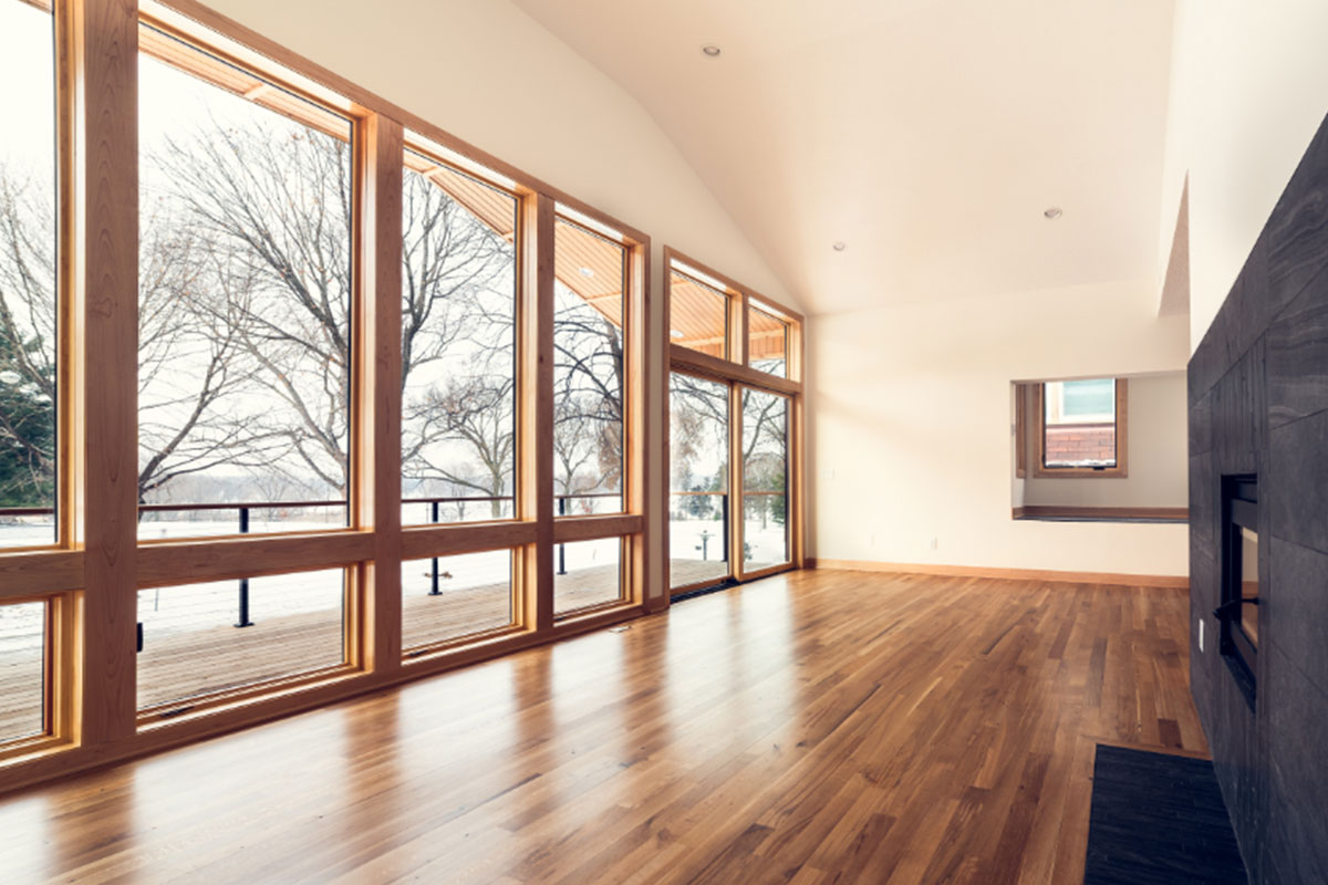 Empty room with large windows covering the whole wall